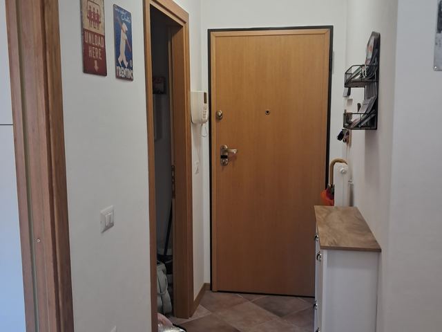 Corridoio d'ingresso verso la porta di casa